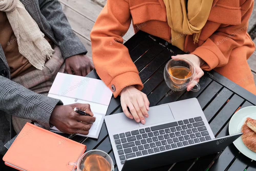 people working on a laptop