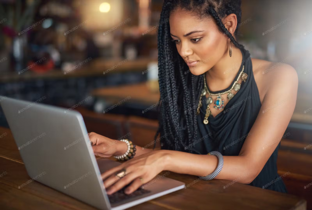 cropped shot of girl working at computer.